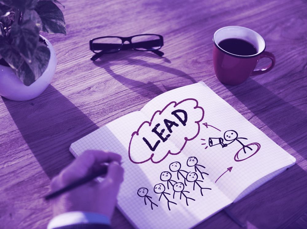 A notebook sketch of lead generation, showing prospects being drawn toward one lead.